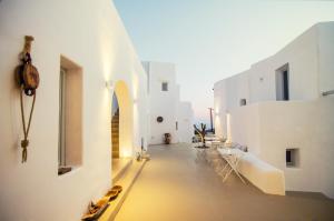 a view of a room with white buildings at White Loft in Ios Chora