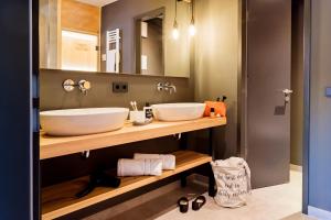 Koupelna v ubytování EchtZeit - Dein Hotelquartier + 19 fotografií