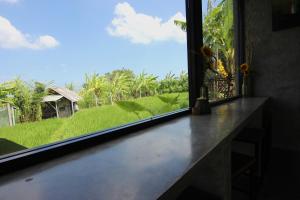 Fotografie z fotogalerie ubytování De Vir House v destinaci Canggu