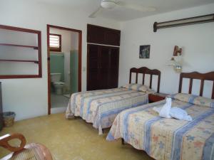 Кровать или кровати в номере Hotel Cozumel Costa Brava
