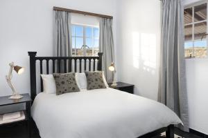Llit o llits en una habitació de Kalahari Farmstead