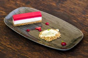a piece of cake on a plate on a table at Villa Andor in Ankaran