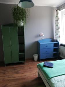 Łóżko lub łóżka w pokoju w obiekcie Comfortable Apartment close to Spodek