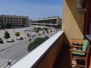 a balcony with a view of a city street at Apartment Center in Čačak