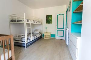 Ένα ή περισσότερα κρεβάτια σε δωμάτιο στο La maison de Vox