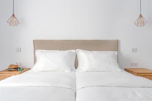 Posteľ alebo postele v izbe v ubytovaní Omnia Mykonos Boutique Hotel & Suites