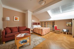 Postel nebo postele na pokoji v ubytování EA Hotel Julis