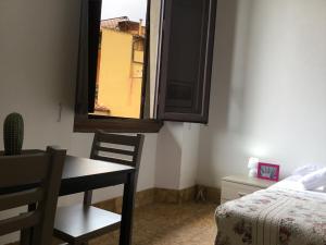 Posteľ alebo postele v izbe v ubytovaní Fortezza Third floor