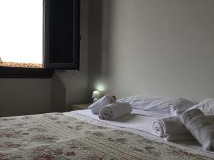 Posteľ alebo postele v izbe v ubytovaní Fortezza Third floor