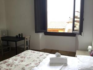 Posteľ alebo postele v izbe v ubytovaní Fortezza Third floor