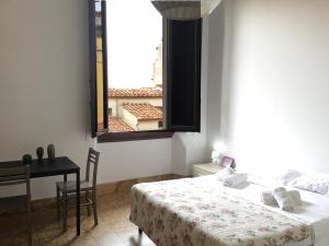 Posteľ alebo postele v izbe v ubytovaní Fortezza Third floor