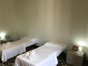 Posteľ alebo postele v izbe v ubytovaní Fortezza Third floor