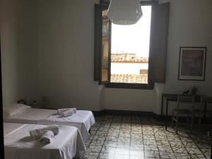 Posteľ alebo postele v izbe v ubytovaní Fortezza Third floor