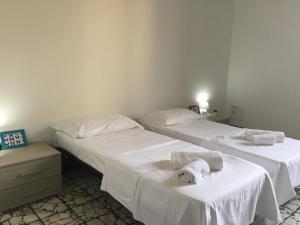 Posteľ alebo postele v izbe v ubytovaní Fortezza Third floor
