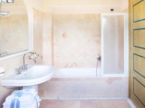Koupelna v ubytování Hotel Mignon