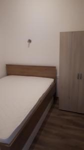 Postel nebo postele na pokoji v ubytování Lido riviera apartman