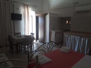 A bed or beds in a room at B&B Carpignano affittacamere