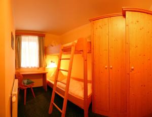 Rúm í herbergi á Hotel Kreutzer