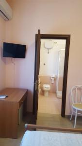 Postel nebo postele na pokoji v ubytování Villa Erry