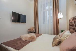 Posteľ alebo postele v izbe v ubytovaní Bengt Apartment Dohány Str.