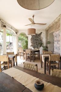 Posezení v ubytování Le Petit Hôtel du Flouka