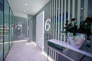 Łóżko lub łóżka w pokoju w obiekcie Hotel 9