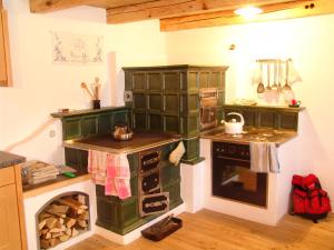 Una cocina o zona de cocina en Schermerhütten