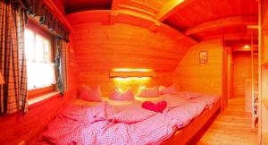 Cama o camas de una habitación en Schermerhütten