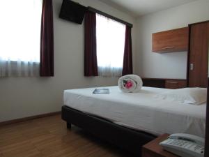 Postel nebo postele na pokoji v ubytování Al Marinaio Hotel Garni