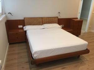 A bed or beds in a room at San Juan by Basquelidays