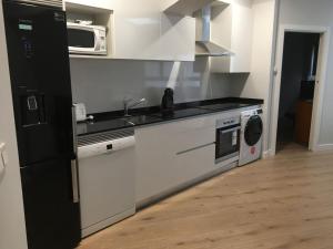 A kitchen or kitchenette at San Juan by Basquelidays Még 10 kép