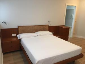 A bed or beds in a room at San Juan by Basquelidays