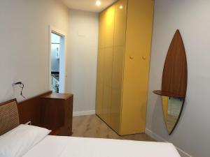 A bed or beds in a room at San Juan by Basquelidays