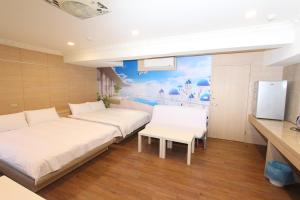 A bed or beds in a room at Sea Keelung 61