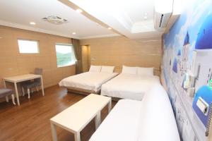 A bed or beds in a room at Sea Keelung 61