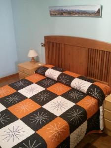 מיטה או מיטות בחדר ב-Hostal Can Barrina