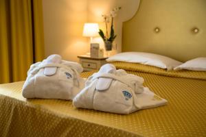 Postel nebo postele na pokoji v ubytování Hotel Terme Principe