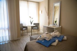 Postel nebo postele na pokoji v ubytování Hotel Terme Principe