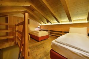 Letto o letti in una camera di Chalet Matteo
