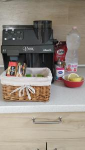 A kitchen or kitchenette at Airport Apartman