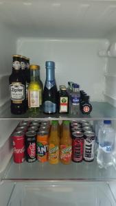 A kitchen or kitchenette at Airport Apartman