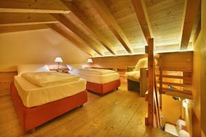 Letto o letti in una camera di Chalet Matteo