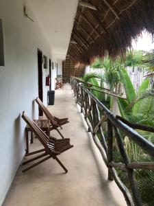 Un balcon sau o terasă la Hotel Casa Bamboo