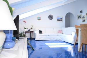 Кровать или кровати в номере La Soffitta Sul Mare