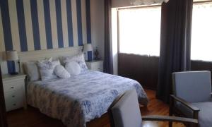 Postel nebo postele na pokoji v ubytování Casa Neira