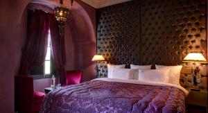 Ein Bett oder Betten in einem Zimmer der Unterkunft Riad Wow