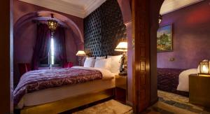 Ein Bett oder Betten in einem Zimmer der Unterkunft Riad Wow