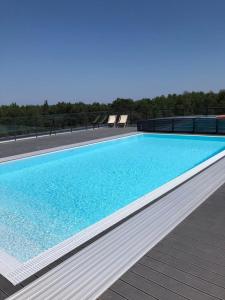 The swimming pool at or close to HELove Apartamenty