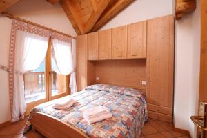 Postel nebo postele na pokoji v ubytování Residenza Al Castello