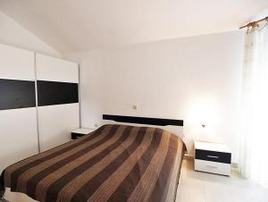 Postel nebo postele na pokoji v ubytování Seaside apartments